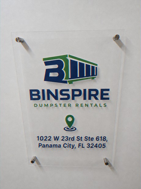 Acrylic office wall sign reading Binspire Dumpster Rentals, 1022 W 23rd St Ste 618, Panama City, FL 32405